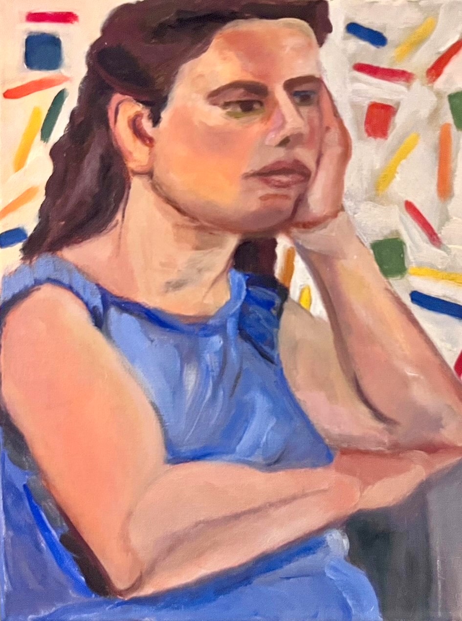 Portrait of woman in blue blouse with head in hand